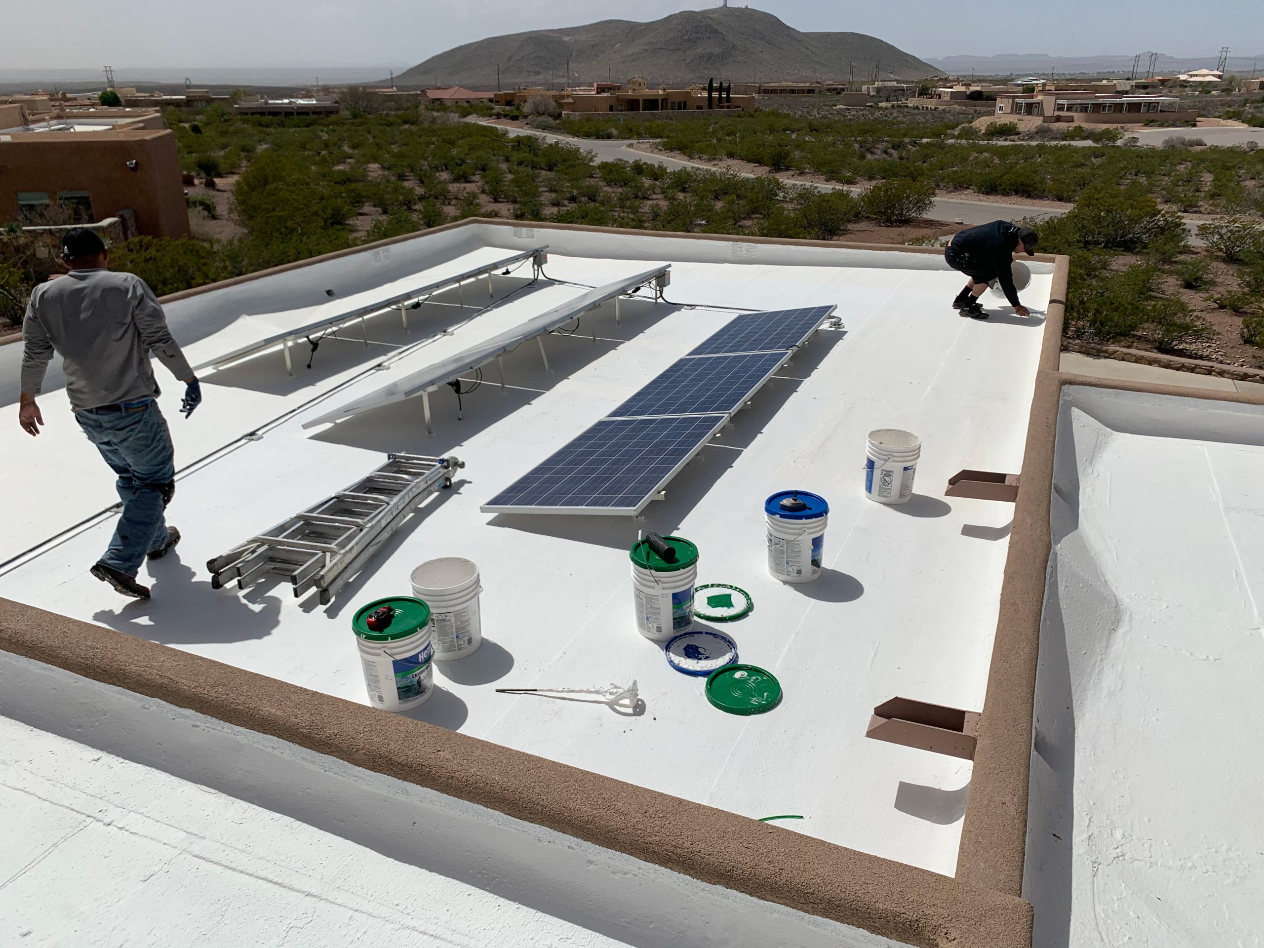 Roof coating project in progress